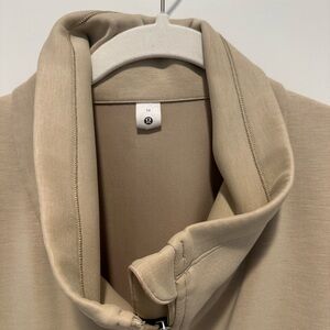 Lululemon cinch waist jacket. Worn once. Perfect condition